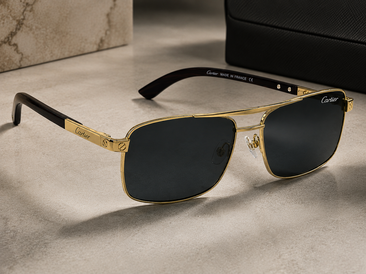 Cartier Santos Sunglasses – Side Angle on Marble Surface with Case