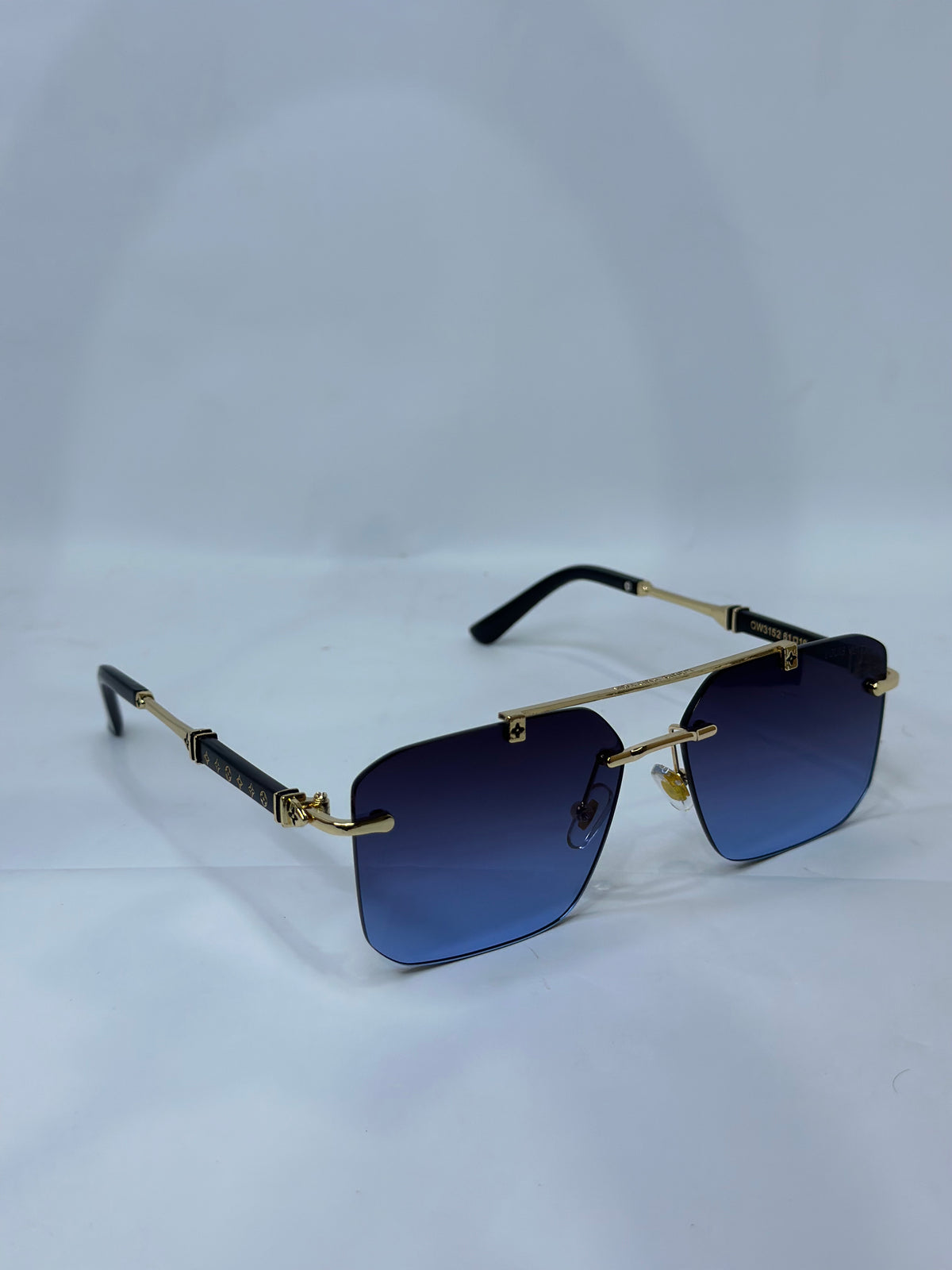 Louis Vuitton Rimless Square Sunglasses Blue Gradient Gold - White Background Overhead Angle