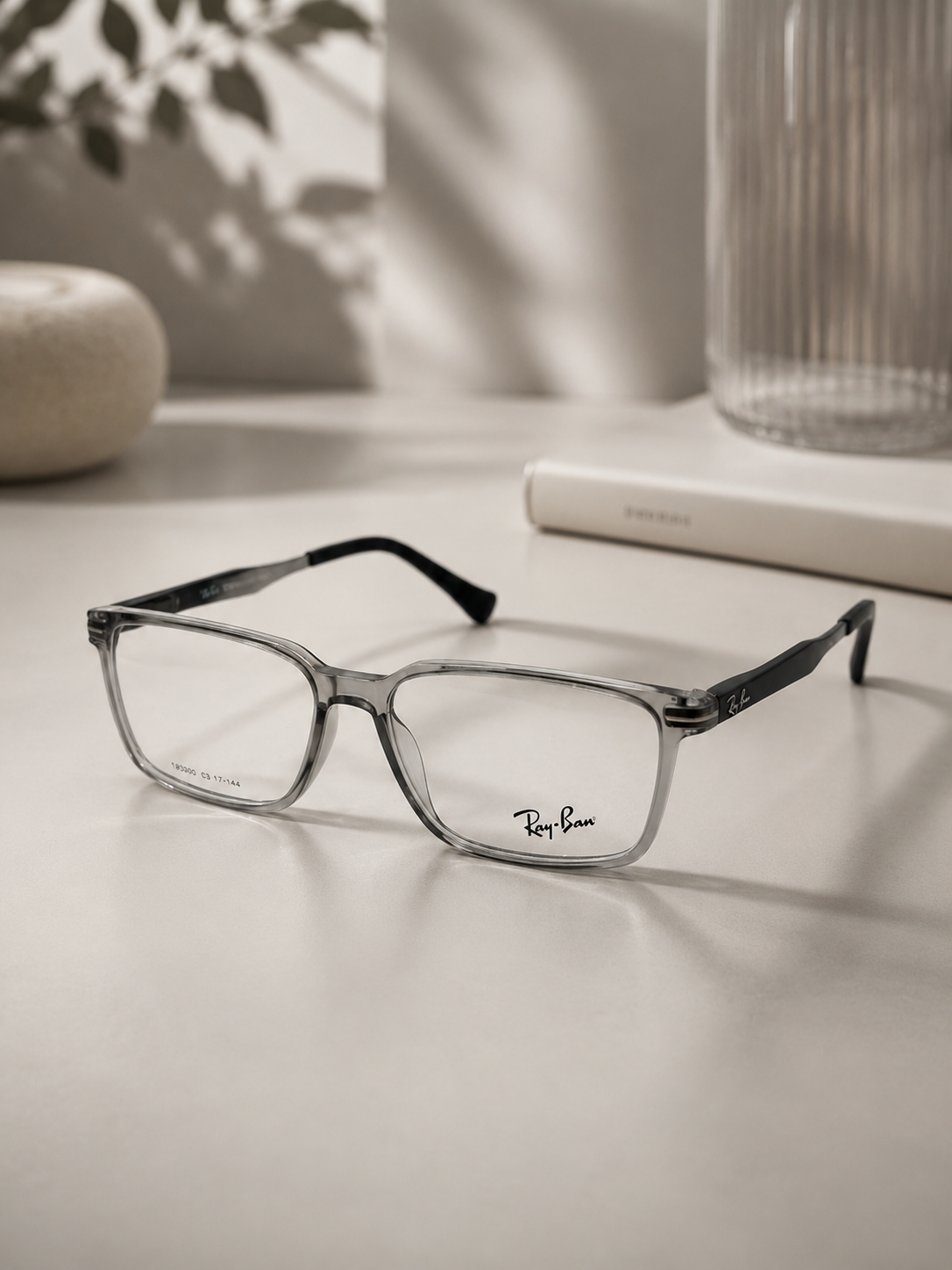 Ray-Ban Rectangular Eyeglasses Transparent Grey - Lifestyle Neutral Surface Angle